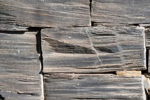 Closeup of rusty Rectangular slate tiles on a sunny day Stock Photos