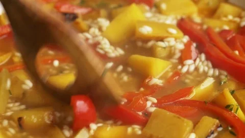 Closeup of rutabaga risotto cooking in a pan Stock Footage 74017510