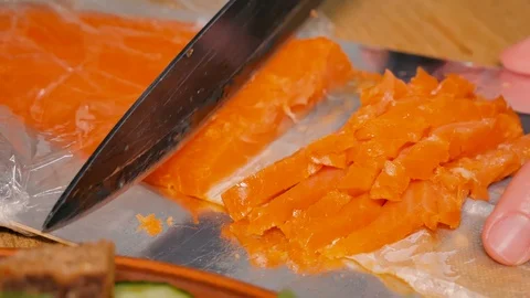 Closeup of salmon slicing in a package Video stock 124169132