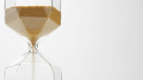 Closeup of a sand clock on the left side of the frame Stock Footage 116335381