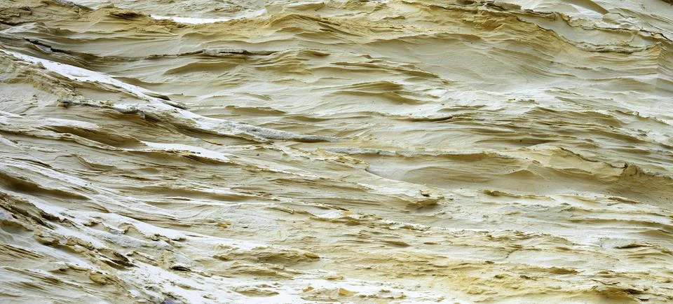 Closeup of sand pattern of a beach in the summer Stock Photos