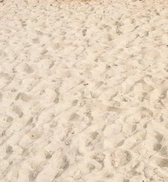 Closeup of sand pattern on a beach in the summer 스톡 사진