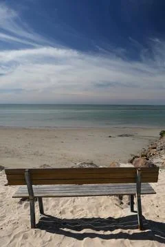 Closeup of a sandy beach in the daylight Stock Photos
