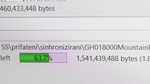 Closeup scale of loading of files on the FTP server from computer monitor, se Stock Footage 161036941