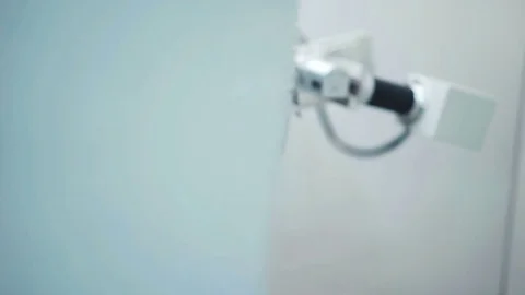 Closeup of a scientist putting test sample into analyzing laboratory machine Stock Footage 85329227