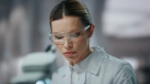 Closeup scientist researching samples in test tube at medical laboratory. Video stock 254608707