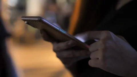 Closeup scrolling phone hand holding phone using mobile smartphone Millennial Vídeos de archivo 336249764