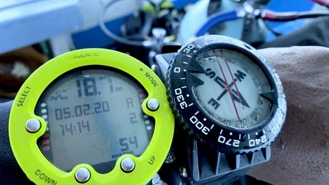 Closeup of scuba diving computer and the compass after open water diving Stock Footage 125842136