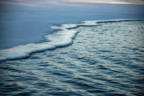 Closeup of the sea waves pattern. Stock Photos
