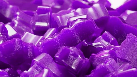 Closeup. Seamless Loop Background. Gummy bears candy. Purple jelly candy bears  Видео 197364265