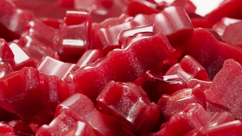 Closeup. Seamless Loop Background. Gummy bears candy. Red jelly candy bears  Stock Footage 197364394
