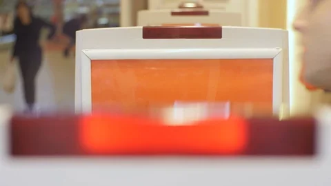 Closeup Security Detector with Blinking Red Lights in Shop Stock Footage 75958344