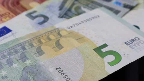 Closeup of security features of Euro banknotes in focus, rotating 360 degrees Stock Footage 271687856