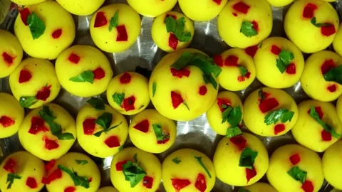 Closeup seen from above and rotating of several little balls of Causa de Lima, 스톡 동영상 171946273