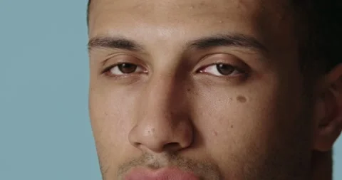 Closeup of serious man posing after beauty routine. Confident guy looking camera Stock Footage 221995705