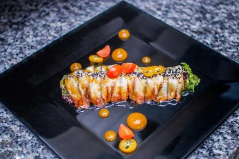 Closeup serving of salad with eel Stock Photos