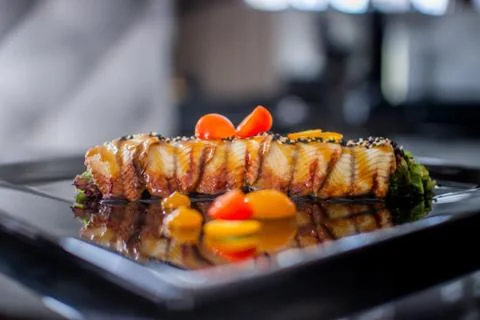 Closeup serving of salad with eel Stock Photos