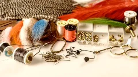 Closeup set of different accessories for knitting flies for fly fishing Stock Photos