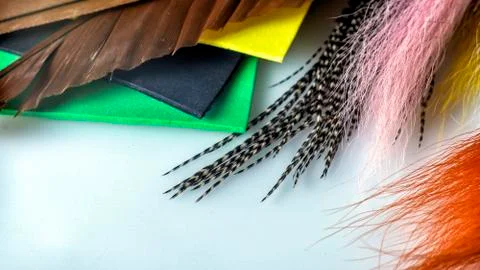 Closeup set of different accessories for knitting flies for fly fishing Foto stock