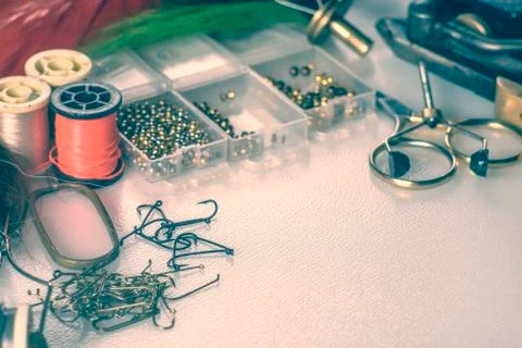 Closeup set of different accessories for knitting flies for fly fishing Stock Photos
