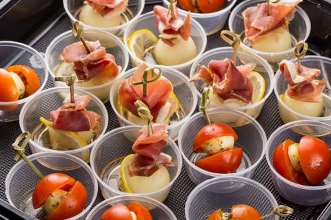 Closeup set different canapes and snacks Stock Photos