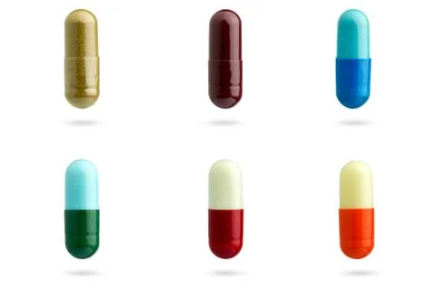 Closeup set of multicolor capsule medication. Stock Photos