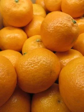 Closeup of several clementines Stock Photos