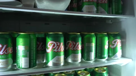 Closeup of several PILSEN beer cans in a refrigerator - Punta Hermosa, Peru - Stock Footage 192998339