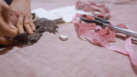 Closeup sewing accessories. scissors, cloth, tape measure, tape Stock Footage 72294705