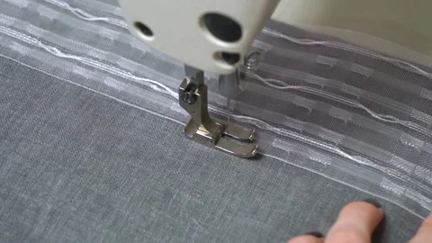 A CloseUp of a Sewing Machine Capturing the Intricate and Detailed Stitching Stock Footage 310266420
