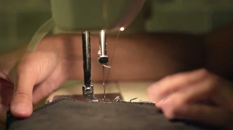 Closeup of sewing machine with the hands Video stock 55490846