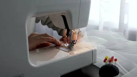 Closeup of sewing on sewing machine Stock Footage 146855546