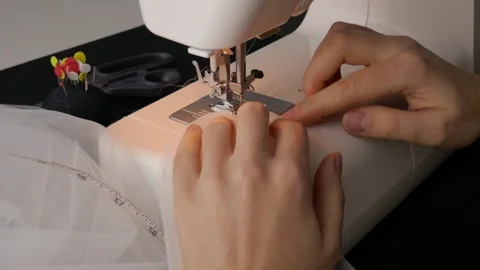 Closeup of sewing on sewing machine Stock Footage 146857362