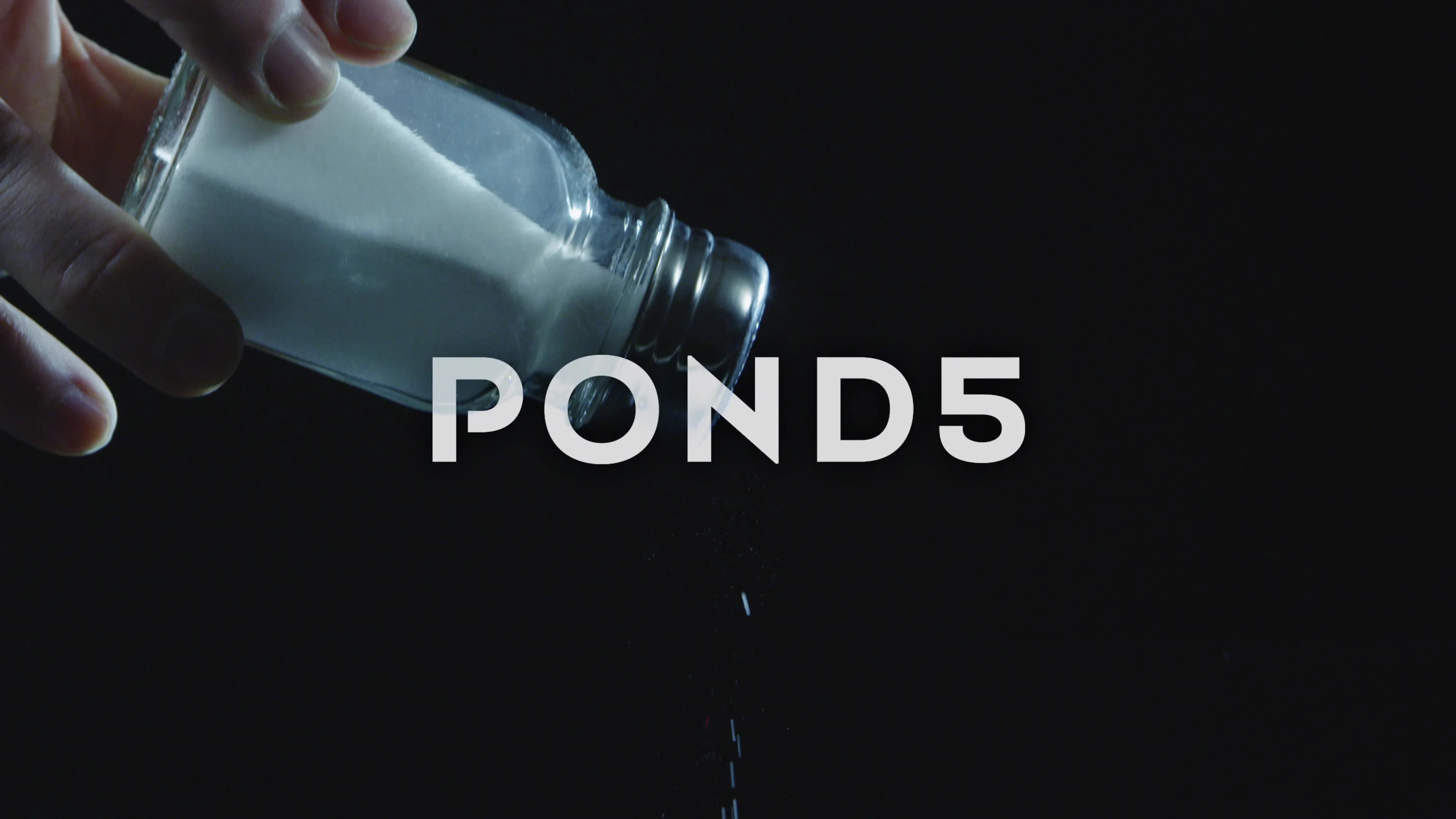 https://images.pond5.com/closeup-shaking-salt-shaker-067360106_prevstill.jpeg