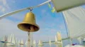 Closeup of shiny bronze bell on yacht, traditional decoration HD Footage