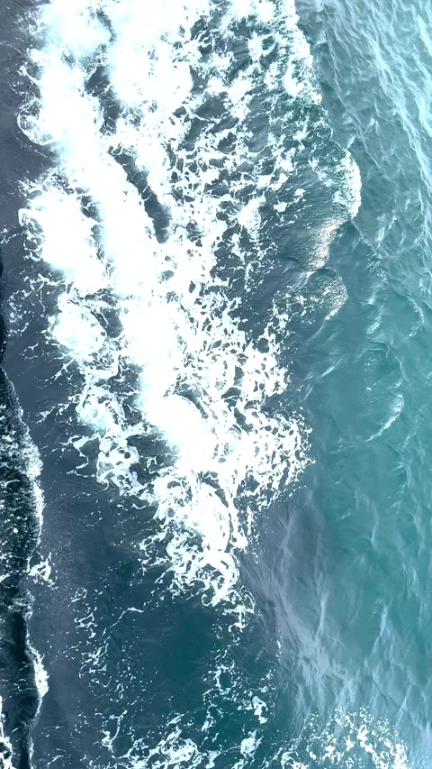 Closeup of Ship Hull with Powerful White Propeller Wash and Foam on Dark Ocean Видео 334370308