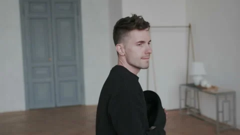 Closeup shoot. Camera moves around hight emotional sexy and sensual guy while he Stock Footage 107815621