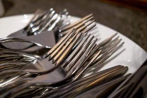 Closeup shoot of fork in a plate Stock Photos