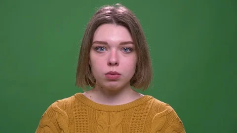 Closeup shoot of young attractive short haired female looking at camera with Stock Footage 108686280