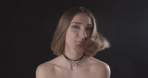 Closeup shoot of young cute caucasian short haired female with cute makeup and Stock Footage 110299537
