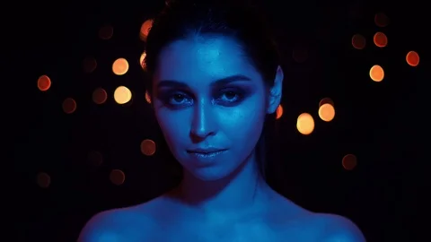 Closeup shoot of young pretty caucasian female with stunning makeup with blue Video stock 106932017
