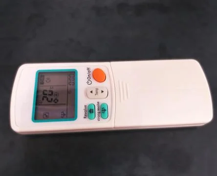 Closeup shot of Ac remote control, selective focus on subject. Stock Photos
