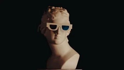 Closeup shot. Ancient marble bust statue of roman era woman in 3d glasses Stock Photos