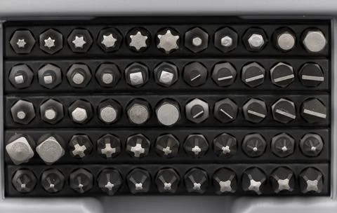 Closeup shot of bit drivers in a toolset Stock Photos