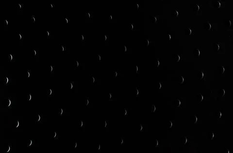 Closeup shot of a black surface with a pattern Foto stock