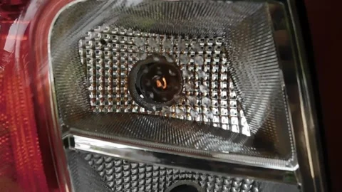 Closeup shot of blinking back light of a car Stock Footage 138023719