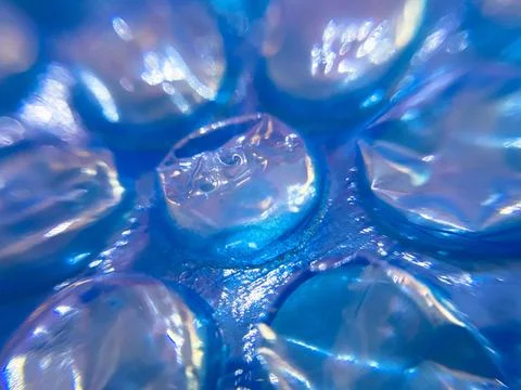 Closeup shot of blue bubble wrap, selective focus Foto stock