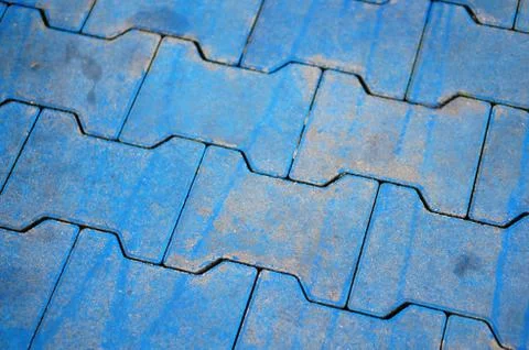 Closeup shot of blue interlocking paver blocks 스톡 사진