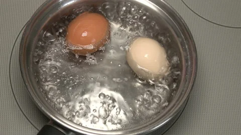 Closeup shot of boiling eggs in the pot. 4K Stock Footage 168408620