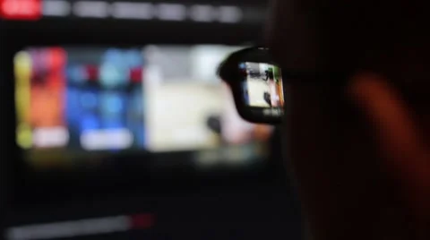 Closeup shot of boy in glasses surfing internet Stock Footage 58606341